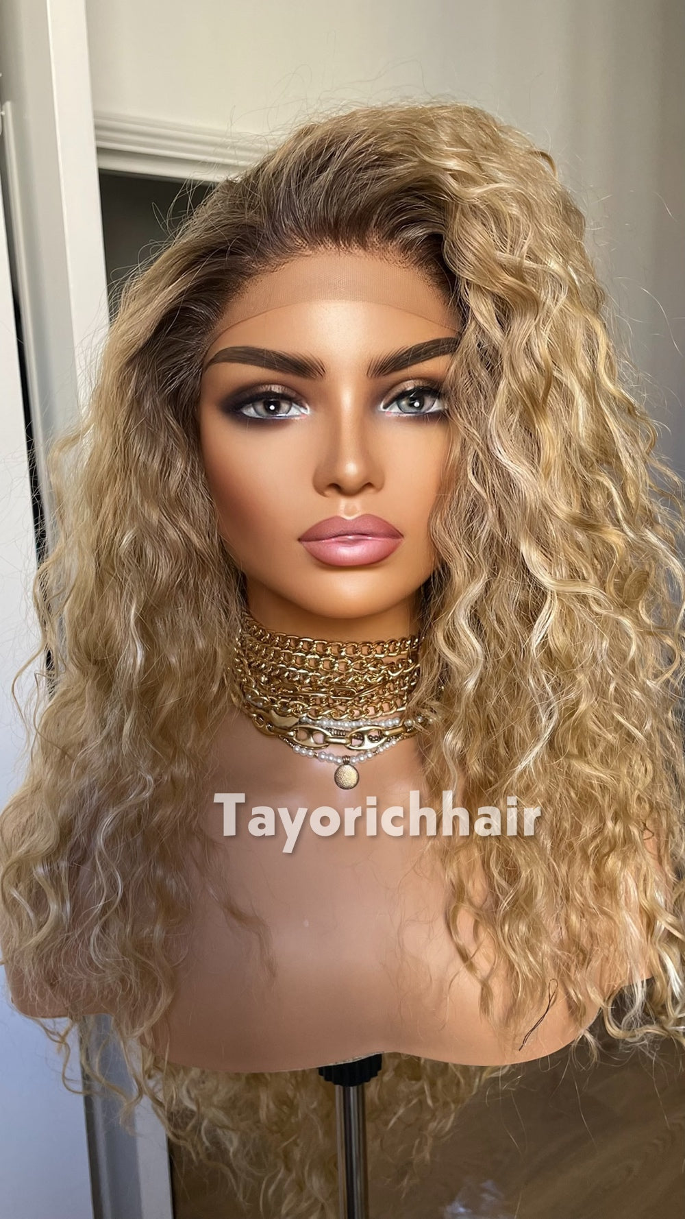 Strawberry Blonde Beach Curly Wig | 22” Layered Heat Safe Synthetic Wig | Blonde Streaks & Dark Roots | 13x3 Transparent Lace | Tayorichhair