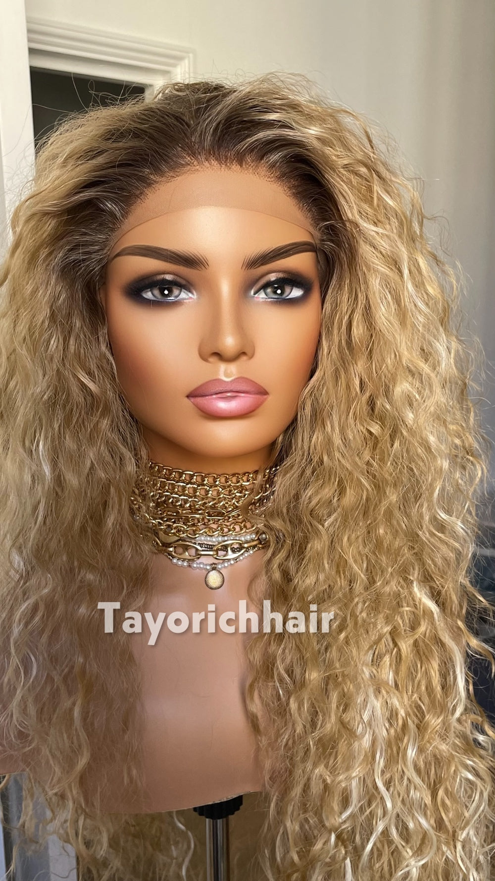 Strawberry Blonde Beach Curly Wig | 22” Layered Heat Safe Synthetic Wig | Blonde Streaks & Dark Roots | 13x3 Transparent Lace | Tayorichhair